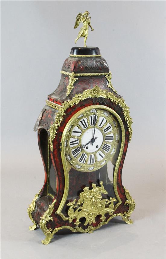 A 19th century French Louis XVI style ormolu and red boulle bracket clock, clock 41.5in. with matching wall bracket (14in.)